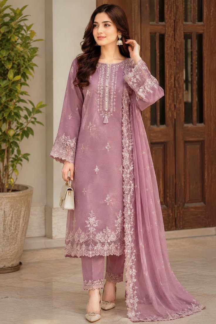 Eid outfit ideas for women in Pakistan featuring pastel lawn and festive dupatta by Al Araf